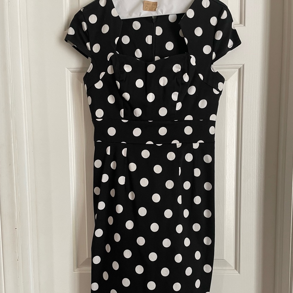 Pinup style skinny black and white polka dot dress.